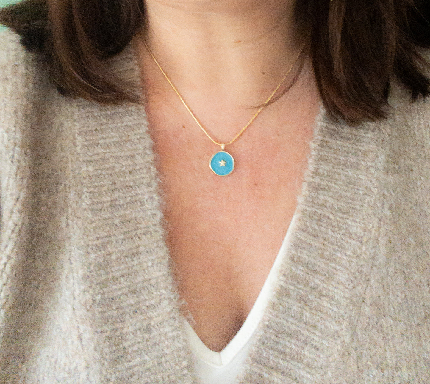Ronde ketting goldplated met hanger blauw met ster