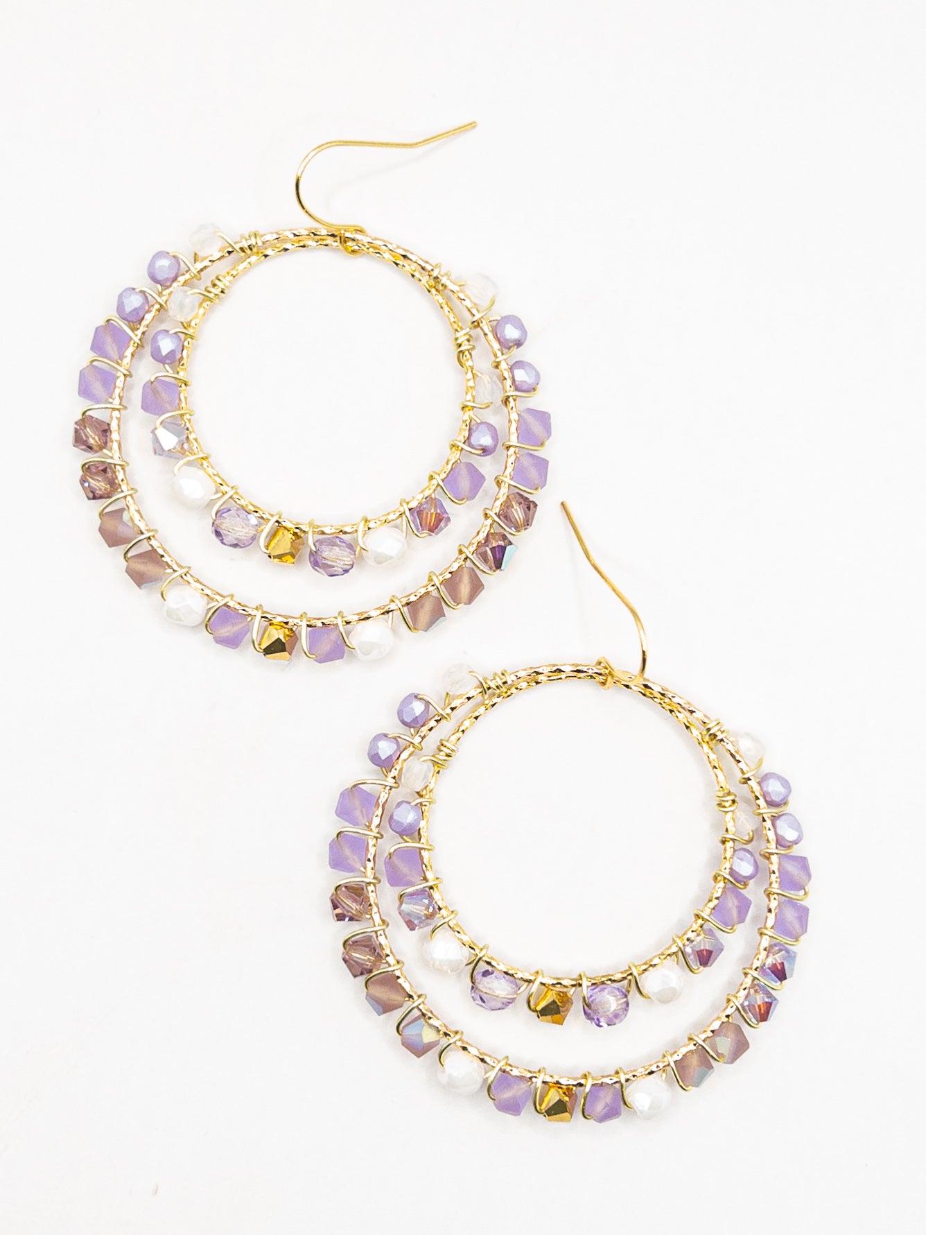 Boho oorbellen in paars wit, goud en lila