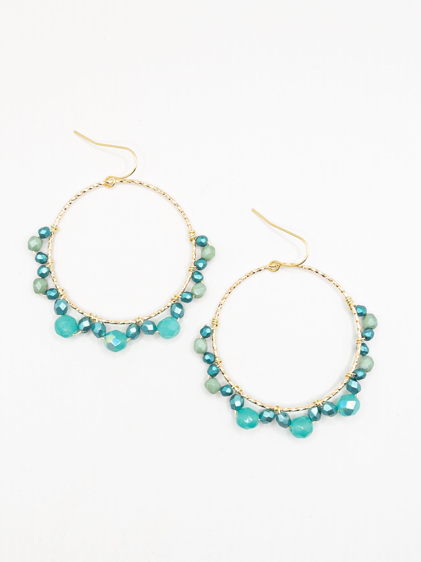 Boho creolen in magic groen