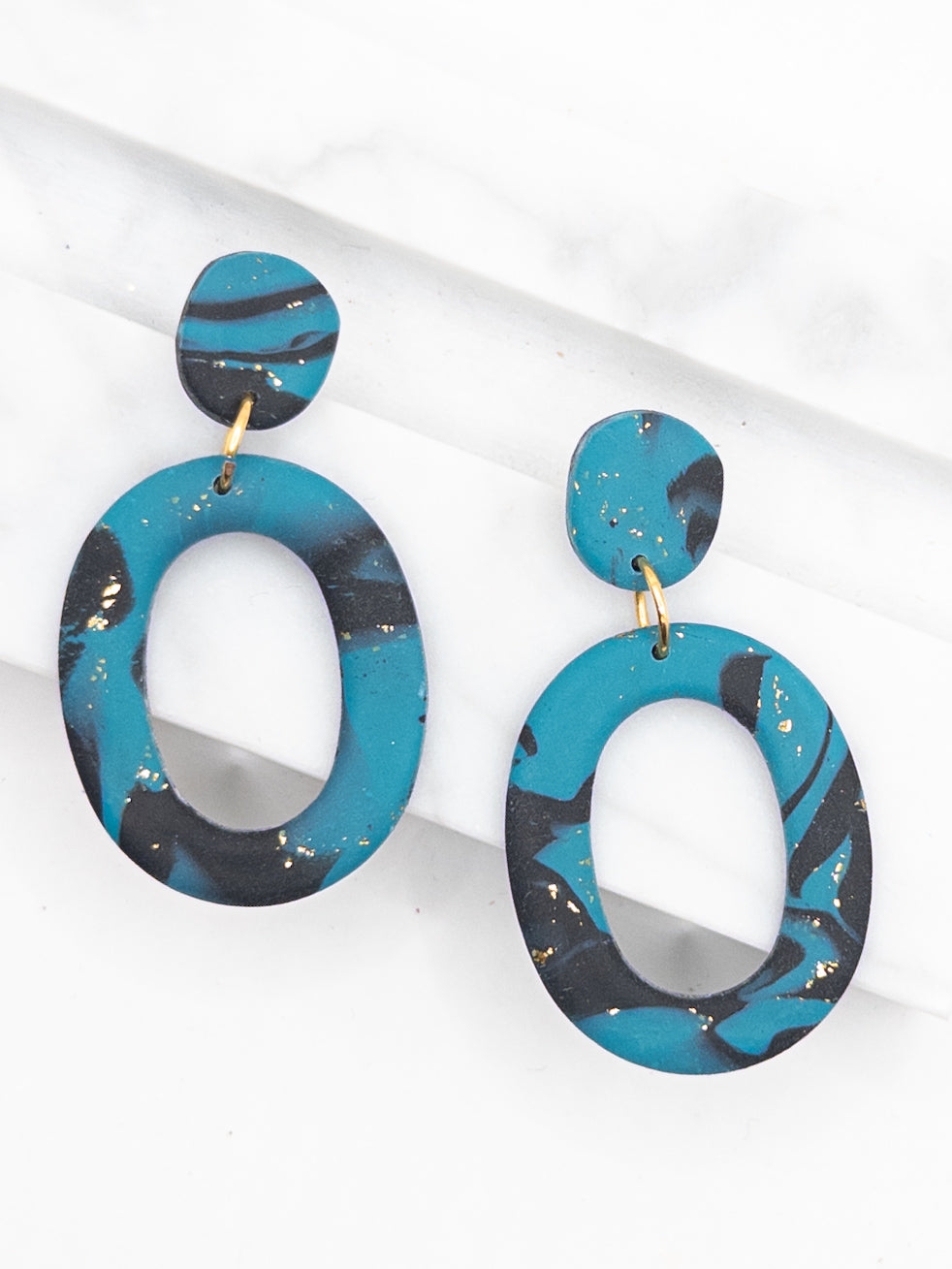 Oorbellen Oval zwart blauw goud