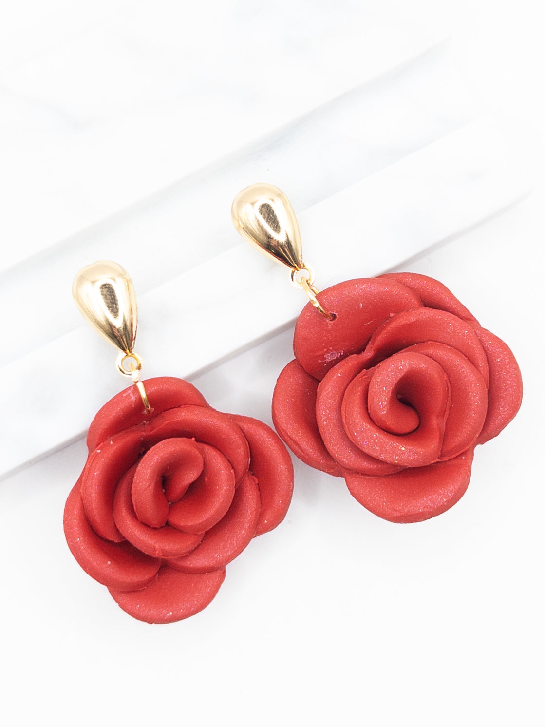 Oorbellen Roos rood goud