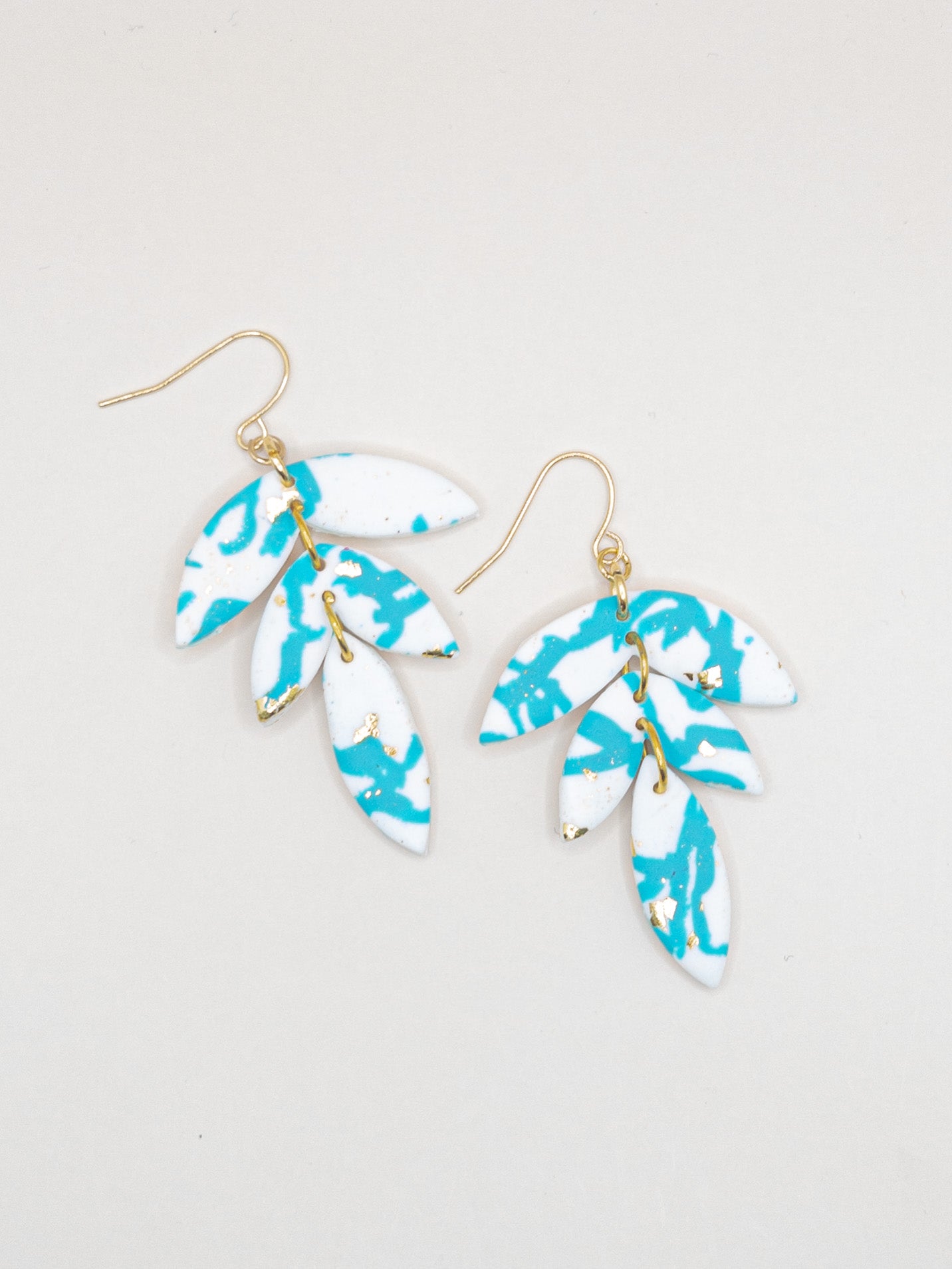Oorbellen Zante wit aqua goud