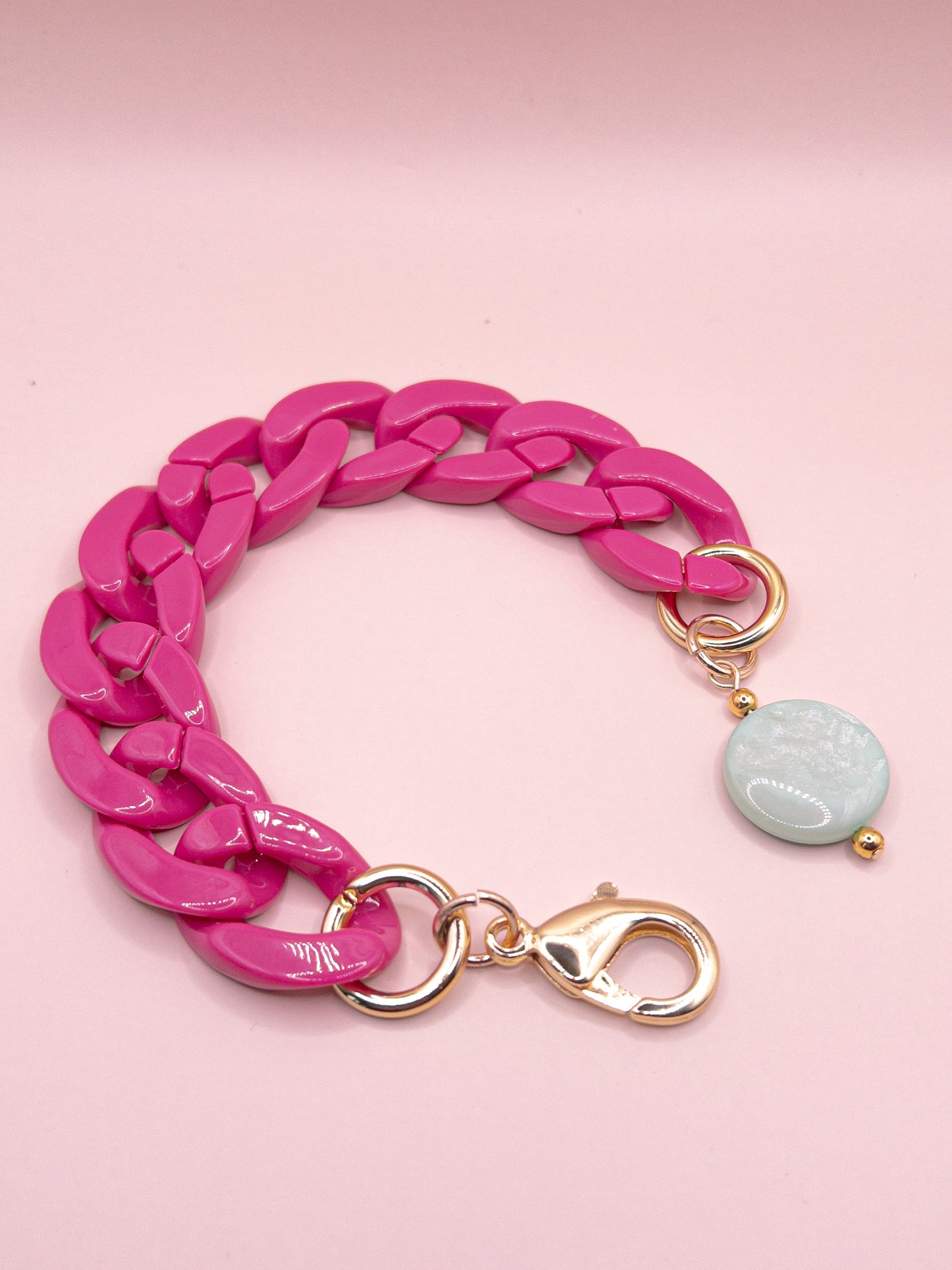 Schakelarmband roze en groen