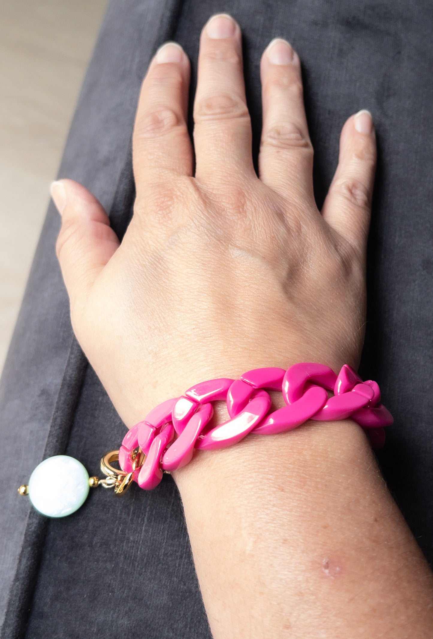 Schakelarmband roze en groen