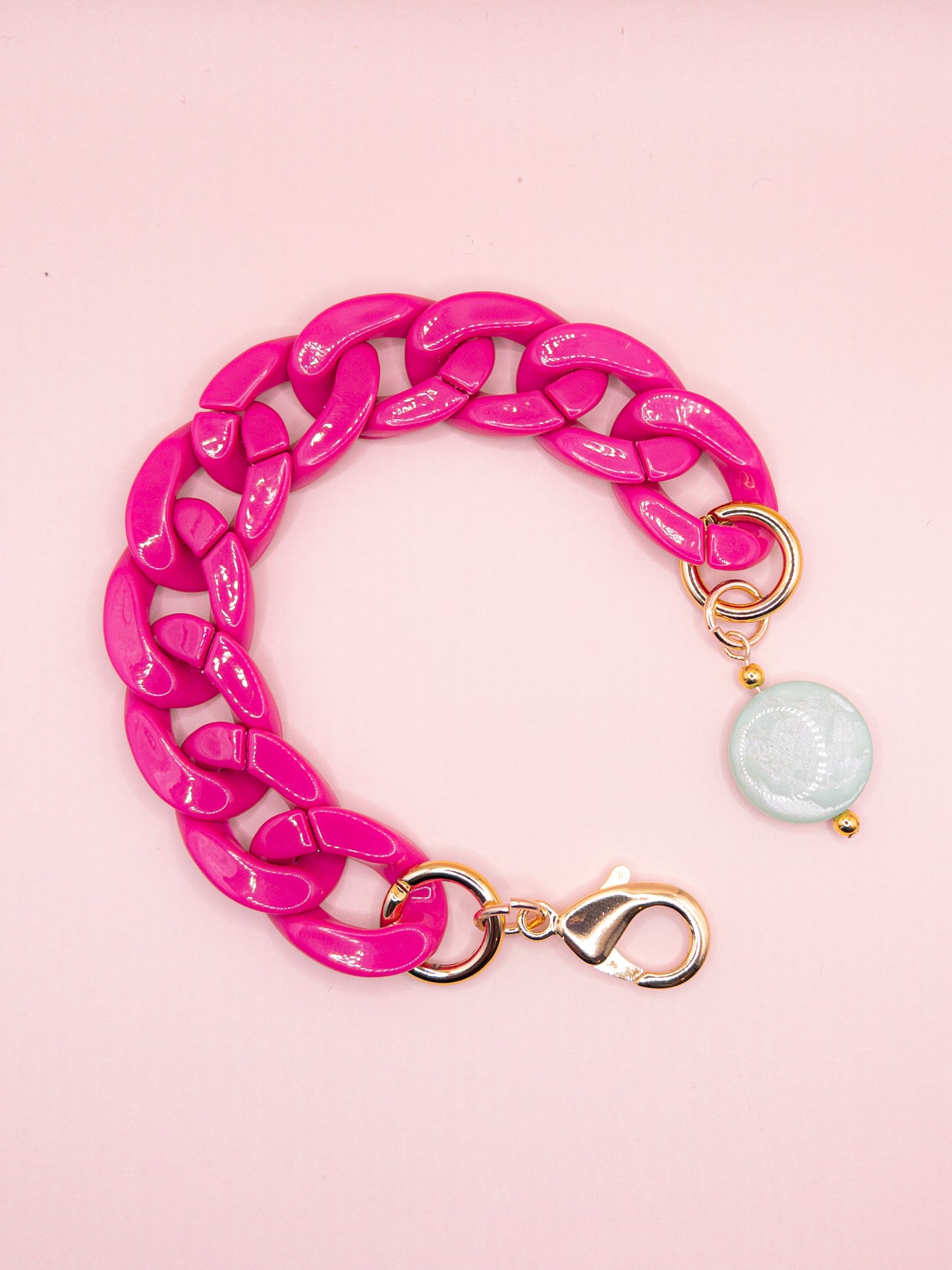 Schakelarmband roze en groen