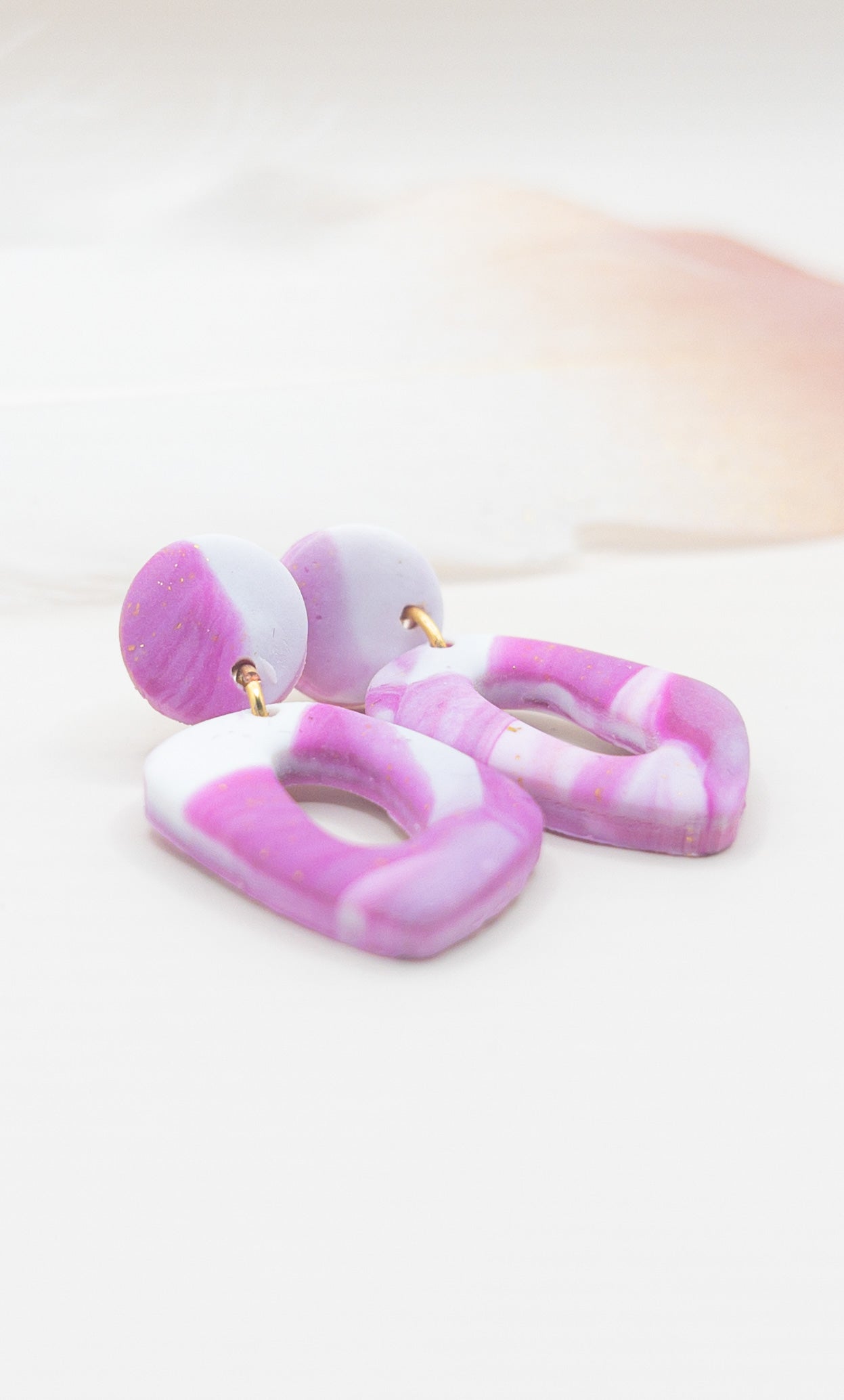 Oorbellen Pom mini roze wit