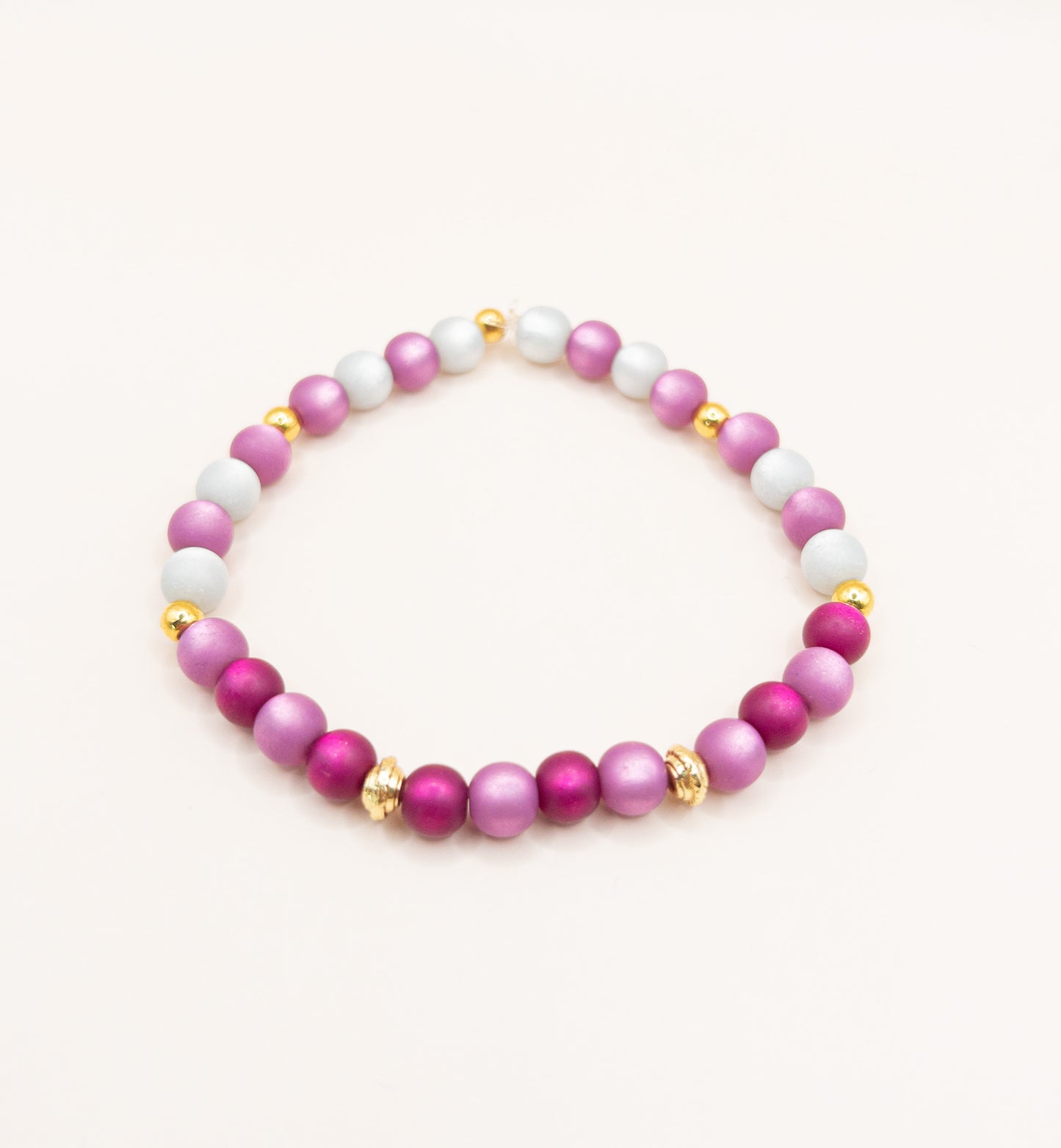 Armband lotus roze goud op elastiek