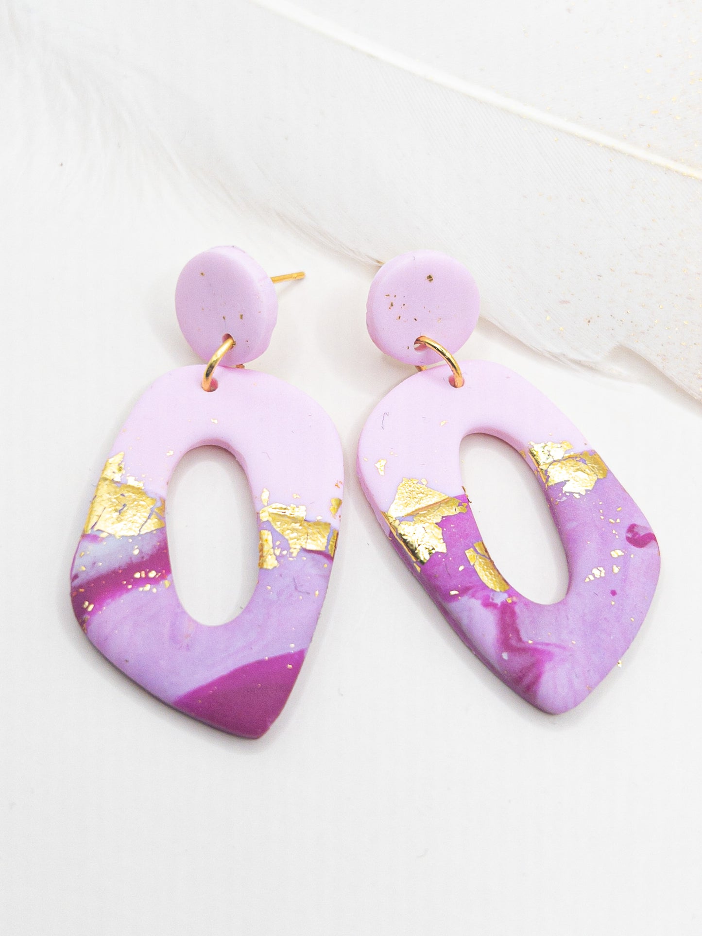 Oorbellen Pom roze goud