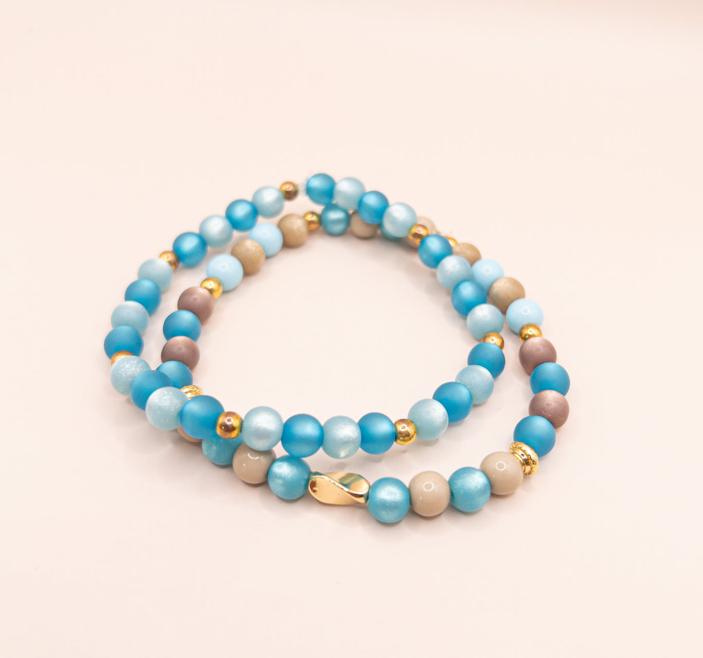 Gerbril armband kralen blauw goud