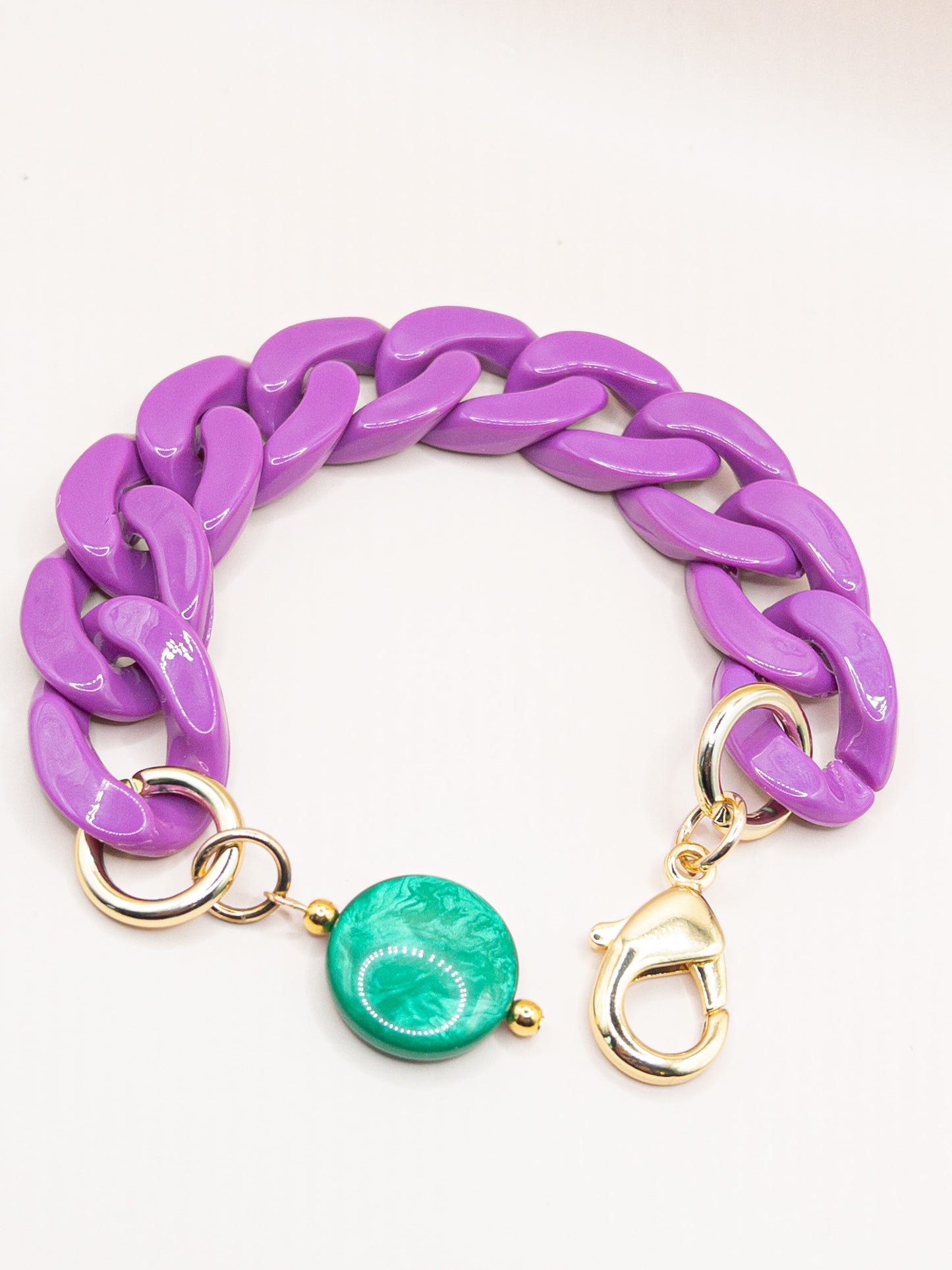Schakelarmband paars / groen