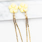 Trendy oorbellen geel goud bloem