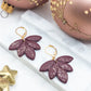 Oorbellen Lotus Bordeaux goud glitter