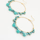 Boho creolen in magic groen