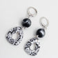 Ink Lace oorbellen zwart wit zilver driehoek