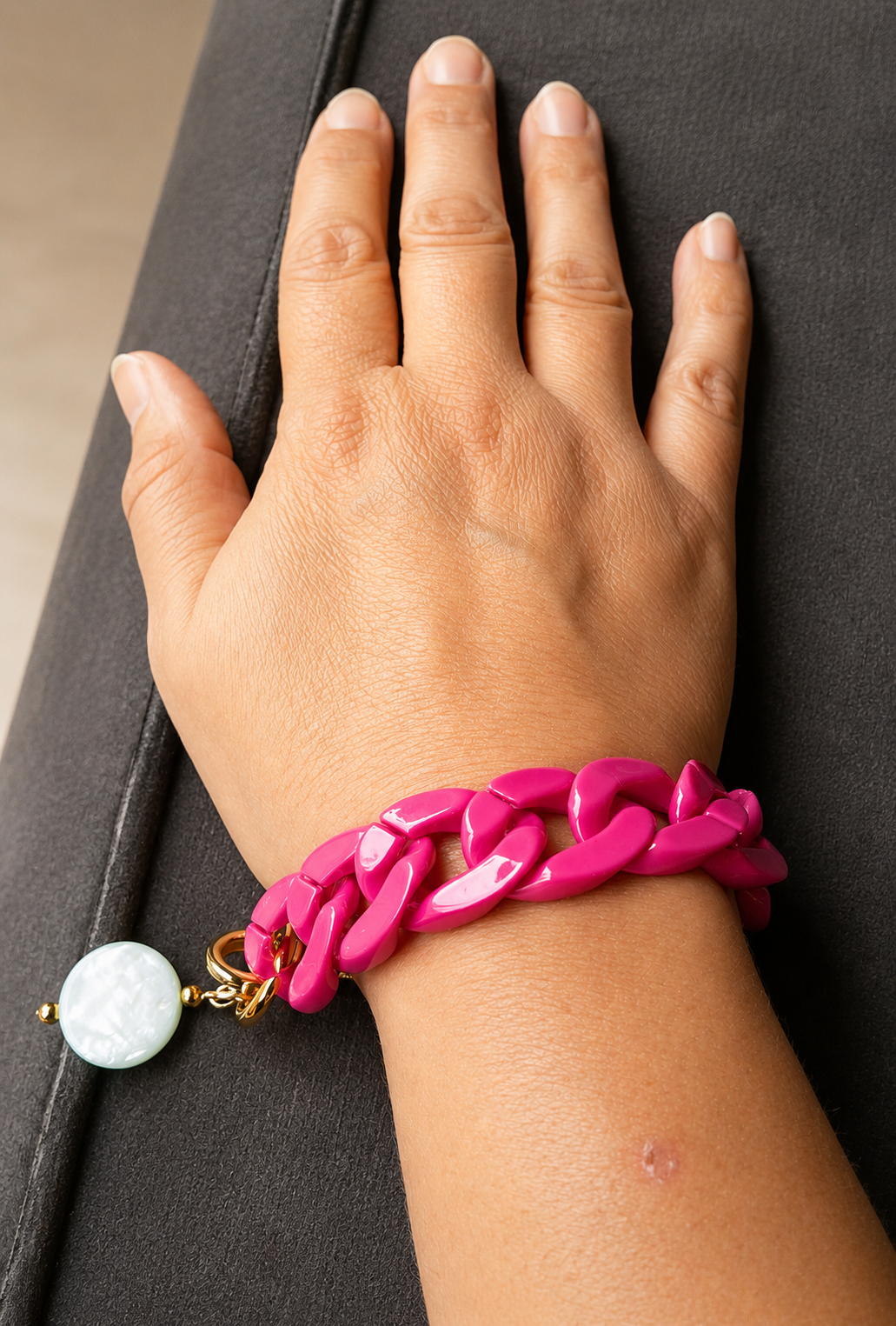 Schakelarmband roze en groen
