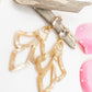 Model Rania oorstekers met glaskraal en beige / zand boho hanger