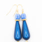 Oorbellen Isis blauw goud