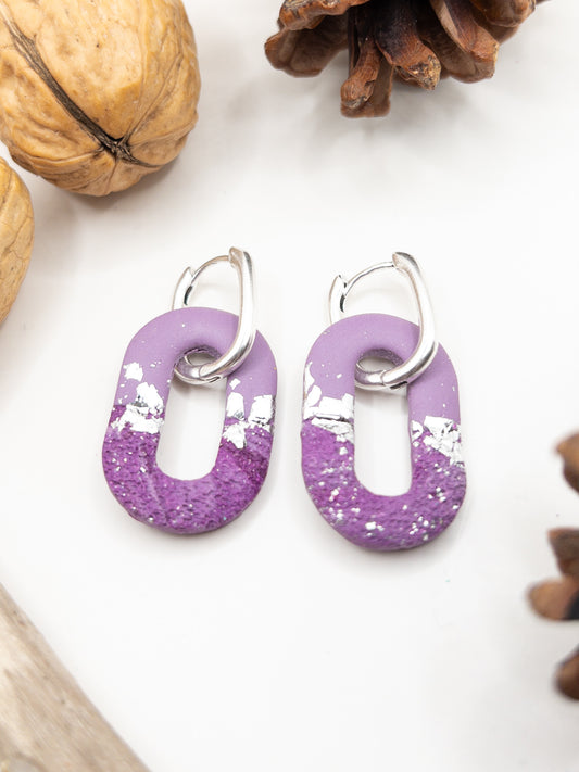 Creool hangers paars lila zilver textuur