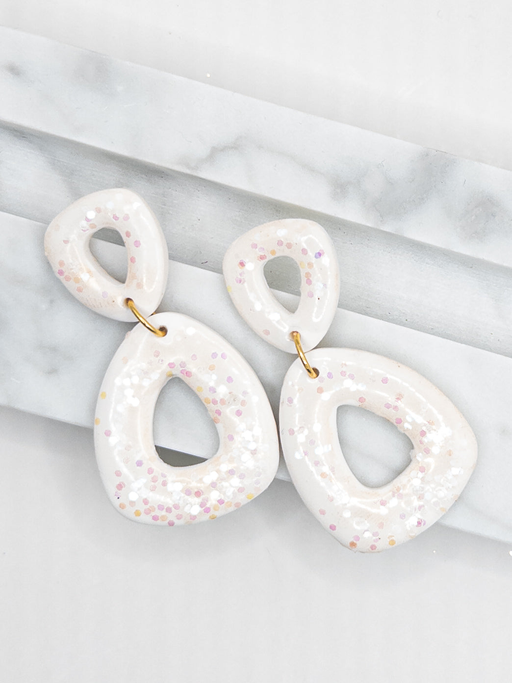 Oorbellen White glitter