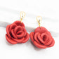 Oorbellen Roos rood goud