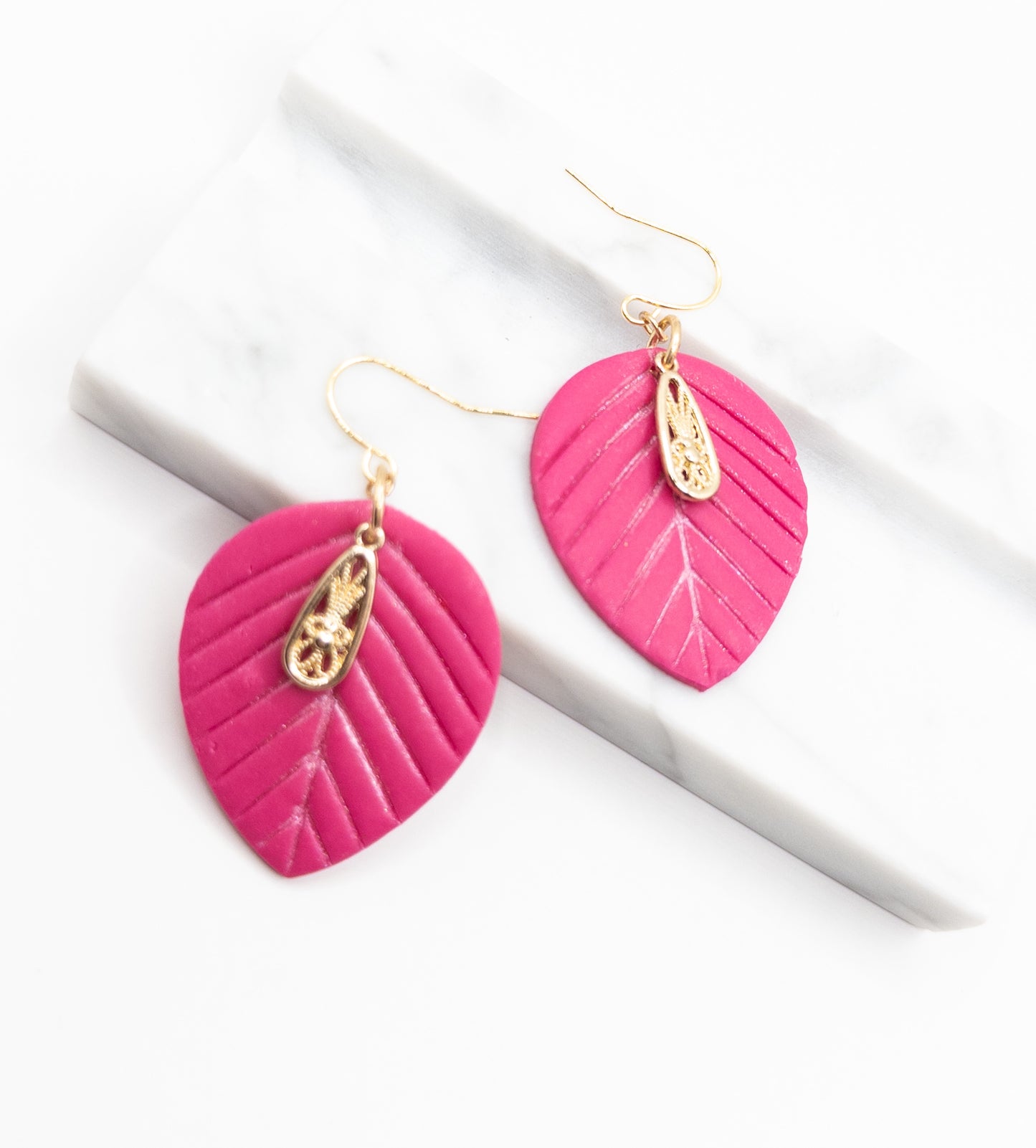 Oorbellen Leaf midi roze goud