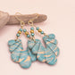 Oorbellen Lavina turquoise perzik goud